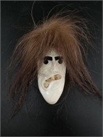 David Kuyutusk ivory mask with hair tusks, comical