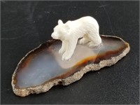 Bone carving of a bear on agate slab, imported 1"