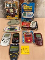 105 - MIXED LOT OF ELECTRONIC GAMES (M62)