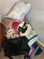 Corner Lot of Bags, Linens, Blankets, and More!