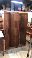 An pine room divider came from the Texas capital