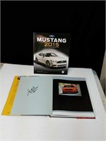 Pair of Ford Mustang 2015 books signed by author
