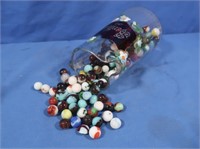 Glass Marbles in Small Glass Pitcher