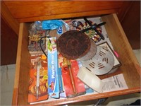 Everything in Middle Drawer left of sink