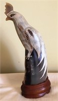 Horn bird carving.