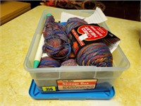 Tote of yarn, knitting needle