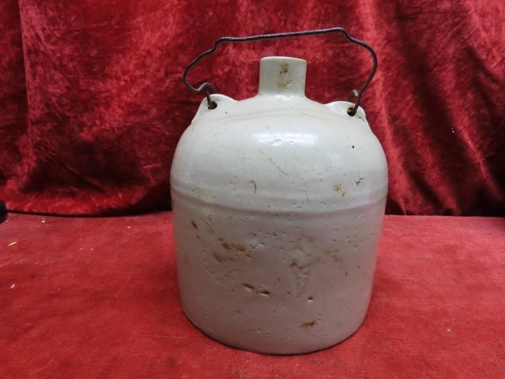 Old stone ware jug. 1 gallon, w/wire handle.