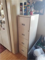 Four Drawer Metal File Cabinet- Contents on Top