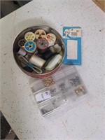 Tin of sewing notions and clasp lot