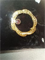 Gold Toned Brooch with gem stone