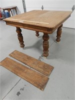 Antique wood dining room table w/2 leaves; top wit