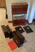 Encyclopedia set, rack, & Country Day yearbooks