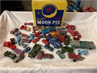 Vintage metal car collection in collector tin