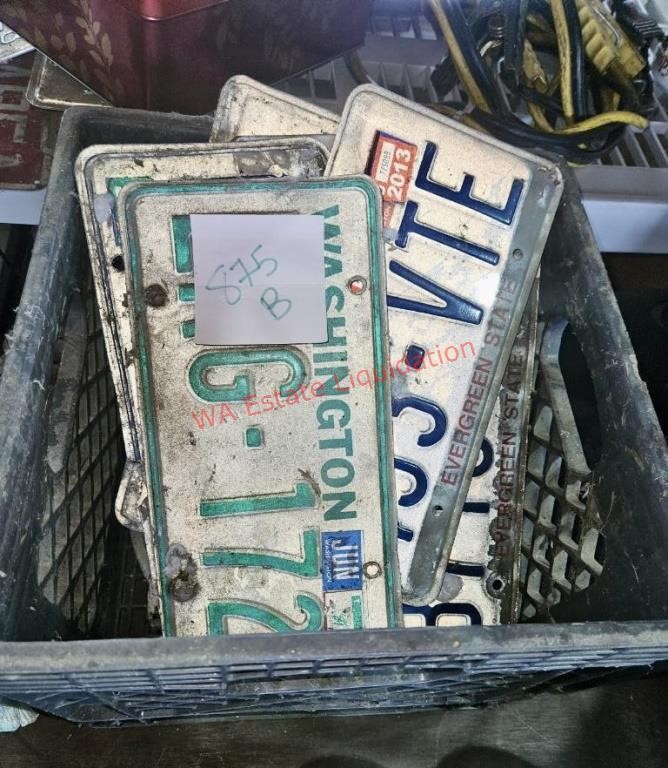 Milk Crate of License Plates (garage)