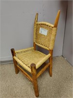 Childs size wicker chair.