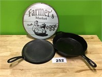 Cast Iron Skillets and Metal Sign