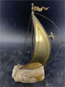 Brass sailboat silhouette set on piece of onyx 10"