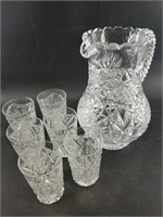 Stunning cut crystal pitcher with 6 matching glass
