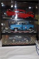 3 Die Cast Cars in Display