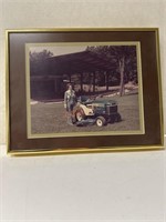 Vintage photo of woman & vintage ford lawnmower