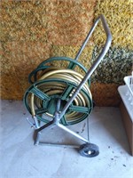 Outdoor water hose and reel on wheels