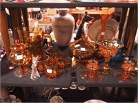 13 pieces of glass, mostly amber, including