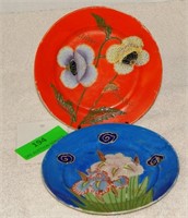 Two small hand-painted Japanese flower plates