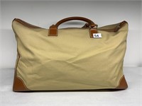 LAMBERTSON TRUEX CANVAS AND LEATHER DUFFLE BAG,