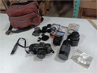 Canon T70 Camera, flash, lens, lens caps & case.