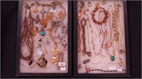 Two containers of costume jewelry: Monet,