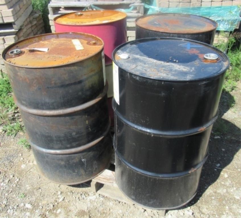 (4) Empty steel barrels.