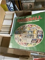 baseball card collecting album with cards from