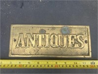 Brass antiques sign