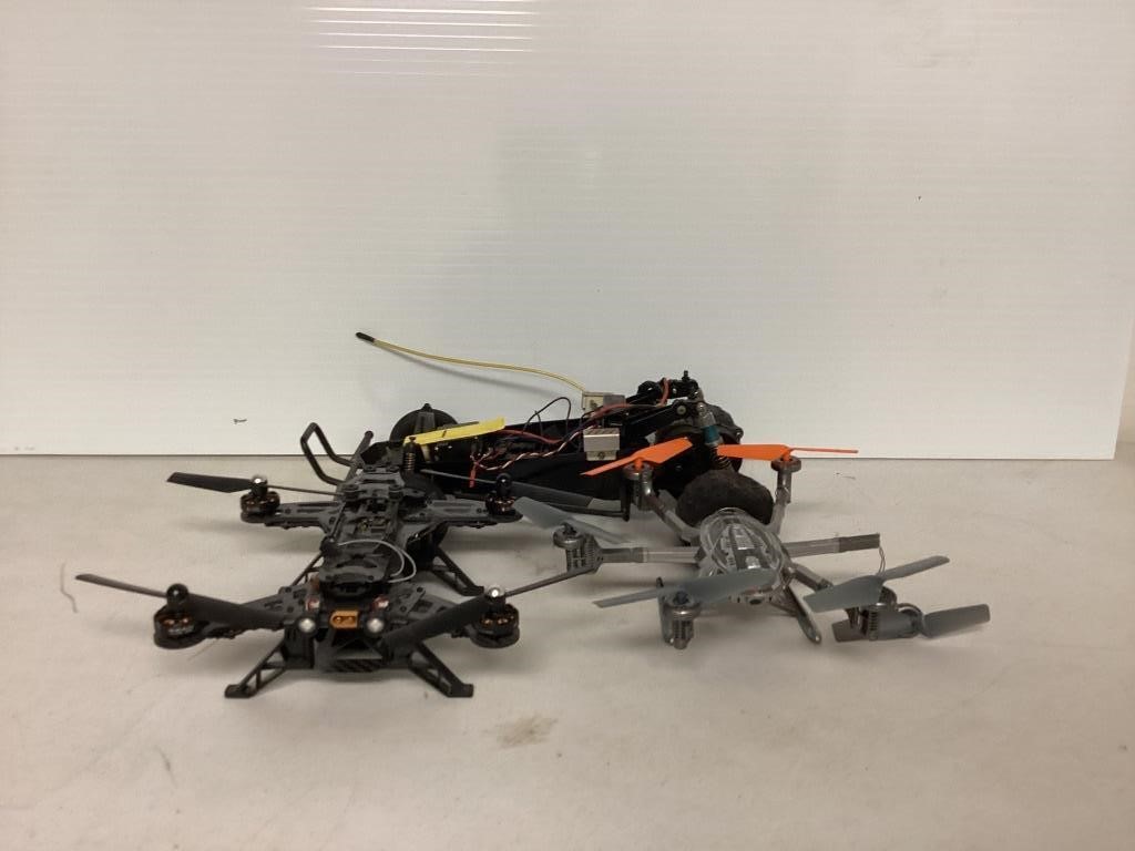 One RC car. Two drones, one drone has a broken