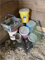 pile of buckets with lids and plastic basket