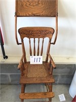 High chair (stationary), wicker seat, carved back