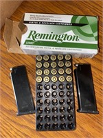 Assortment of 32 automatic ammunition and clips,