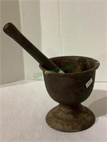 Cast iron mortar and pestle measuring 5 inches