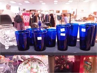 Eight cobalt blue tumblers: four 5 3/4" and four