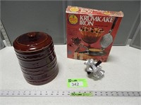 Krumkake iron, cookie jar and Foley cutter