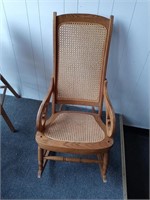 Wicker back rocking chair