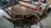 Round leaf table with 6 chairs