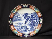 Signed hand painted Chinese charger with gilt