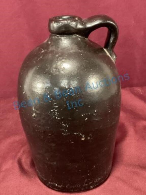 Early stoneware whiskey jug