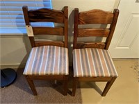 Two wooden matching chairs