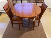 Round breakfast table with two chairs