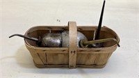 Basket with oil cans