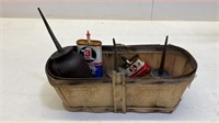 Basket with oil cans