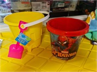 Spiderman & yellow sand buckets