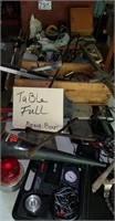 Table Full Garage Items, Red Emergency Light,
